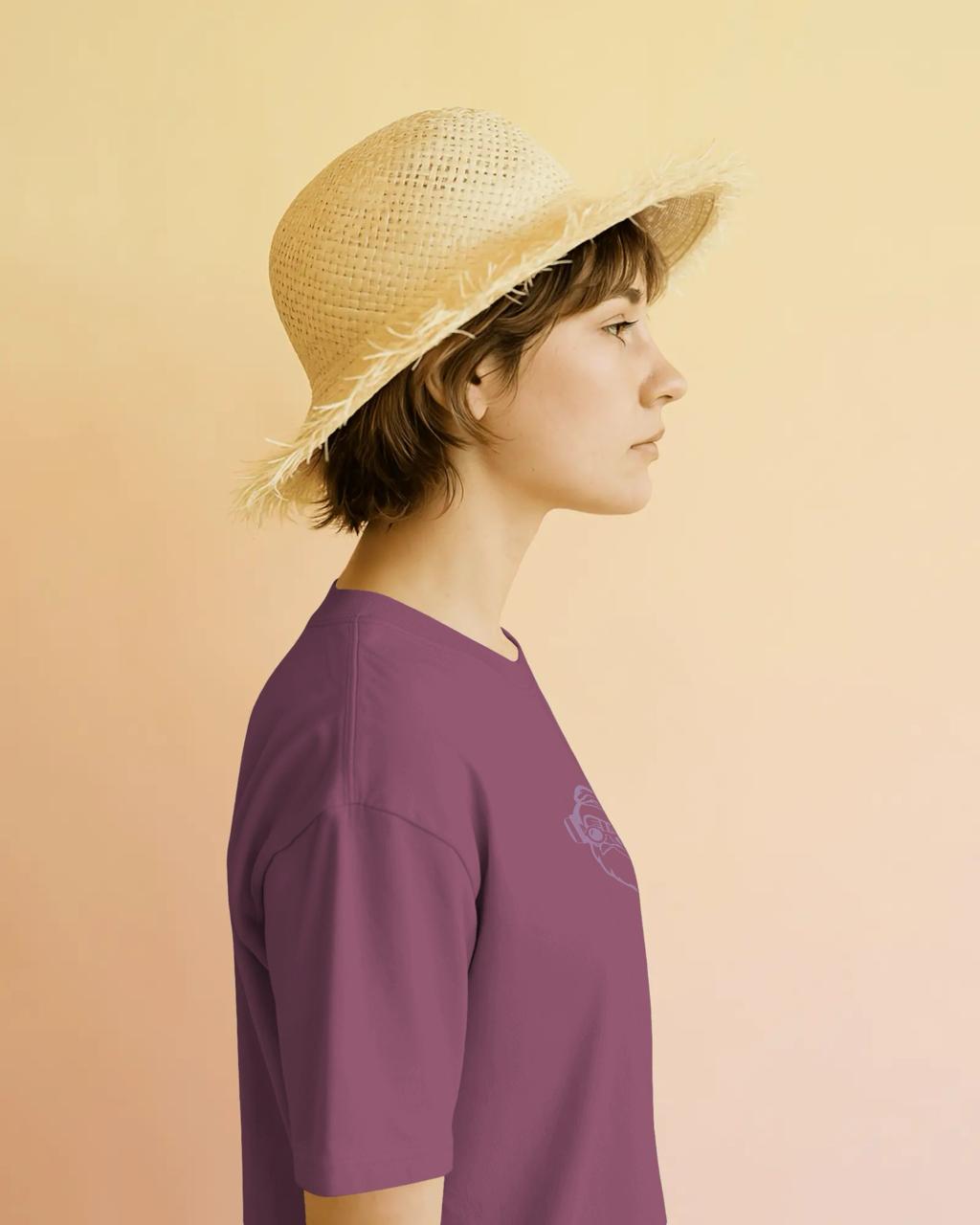 Guru Daddy Red Voilet tee - female side profile with straw hat